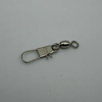 Metal fishing swivel on a gray background
